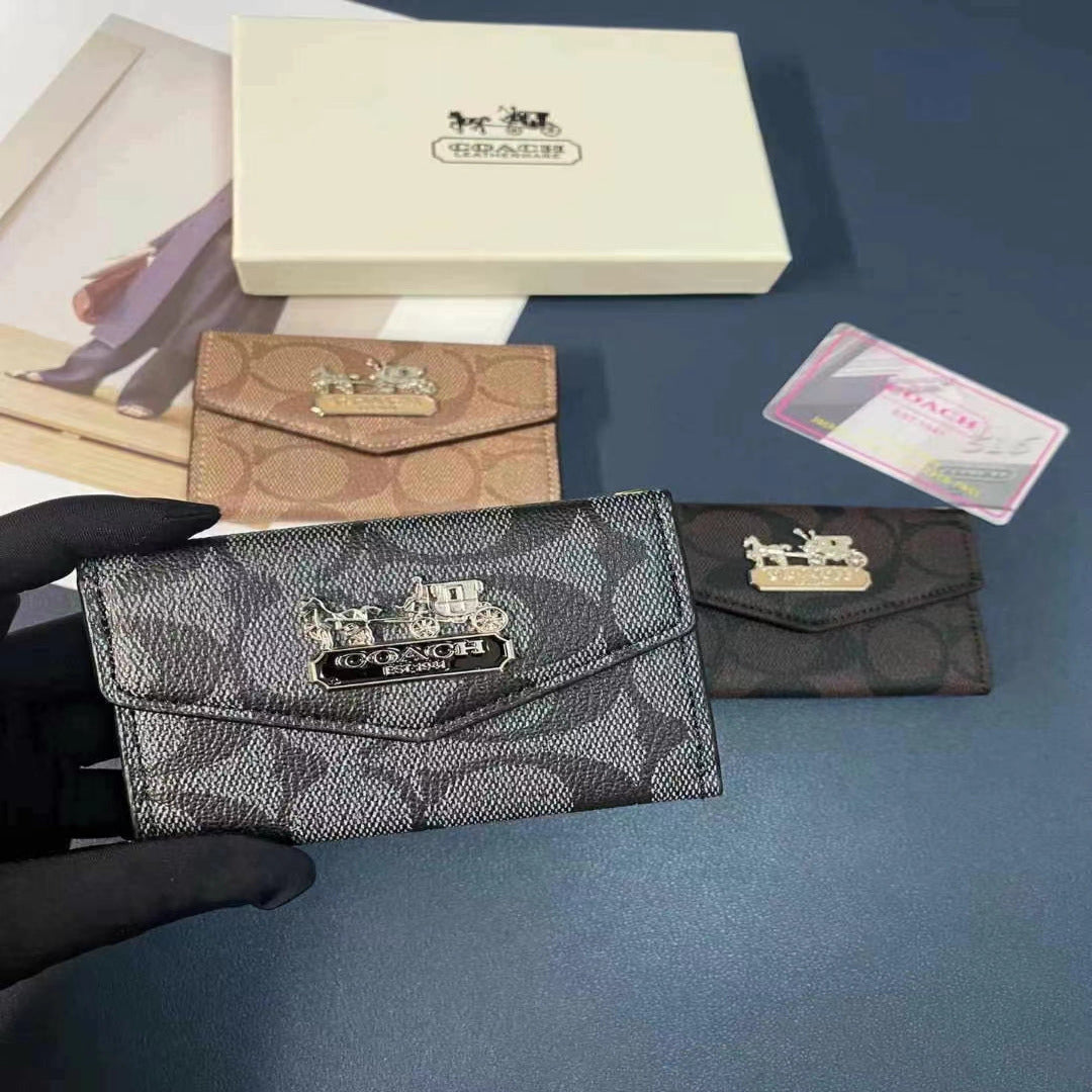Elegant Coach Wallet – Timeless Style & Functionality